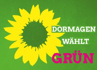 Schriftzug Dormagen wählt Grün mit Sonnenblume